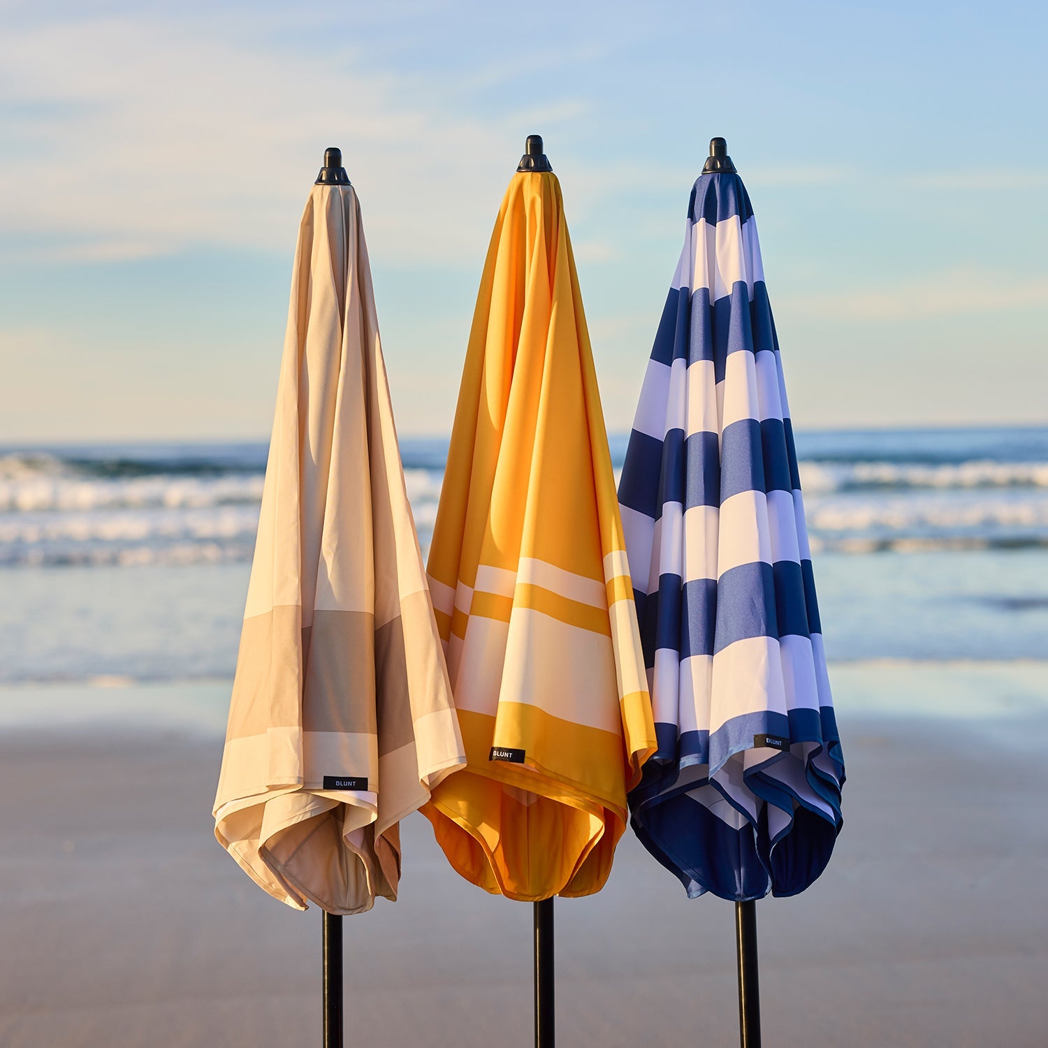 blunt | beach umbrella | sea