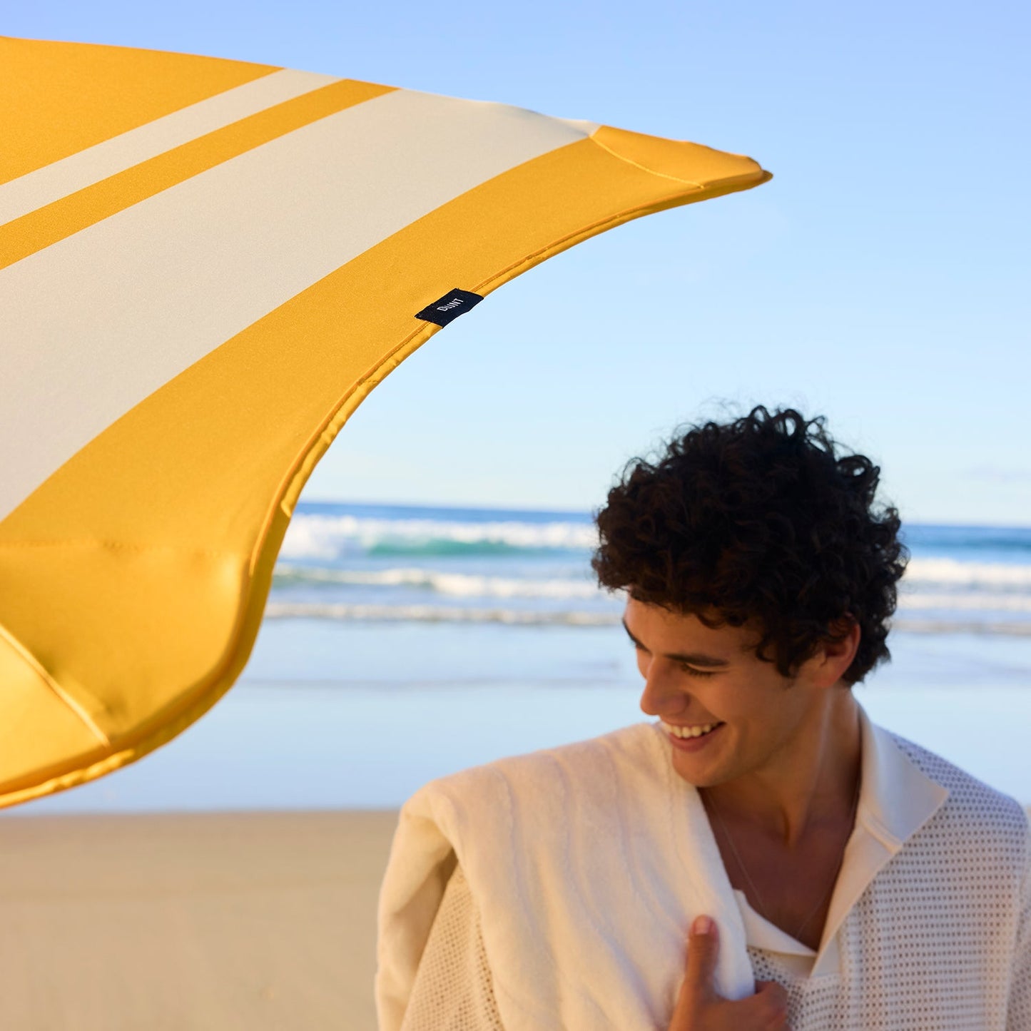 blunt | beach umbrella | sun