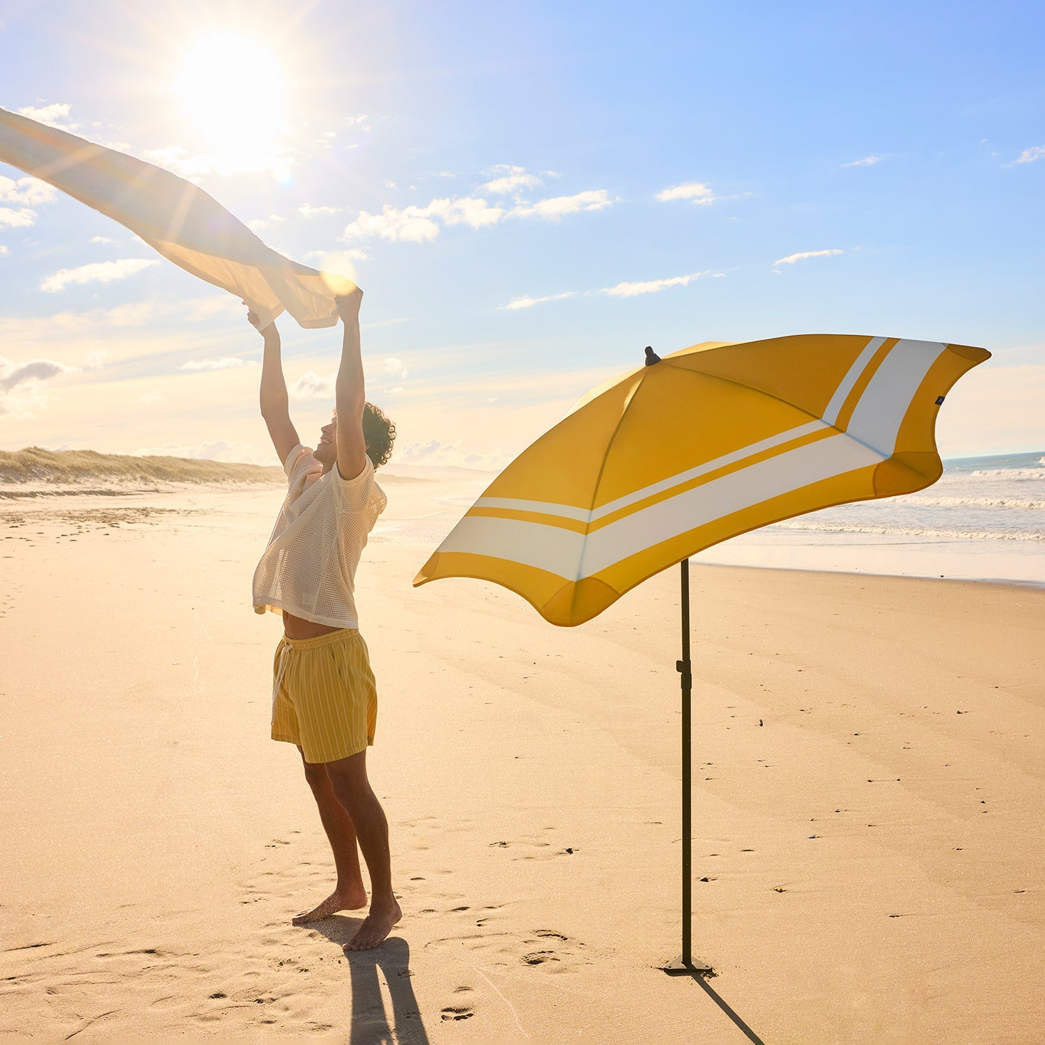blunt | beach umbrella | sun
